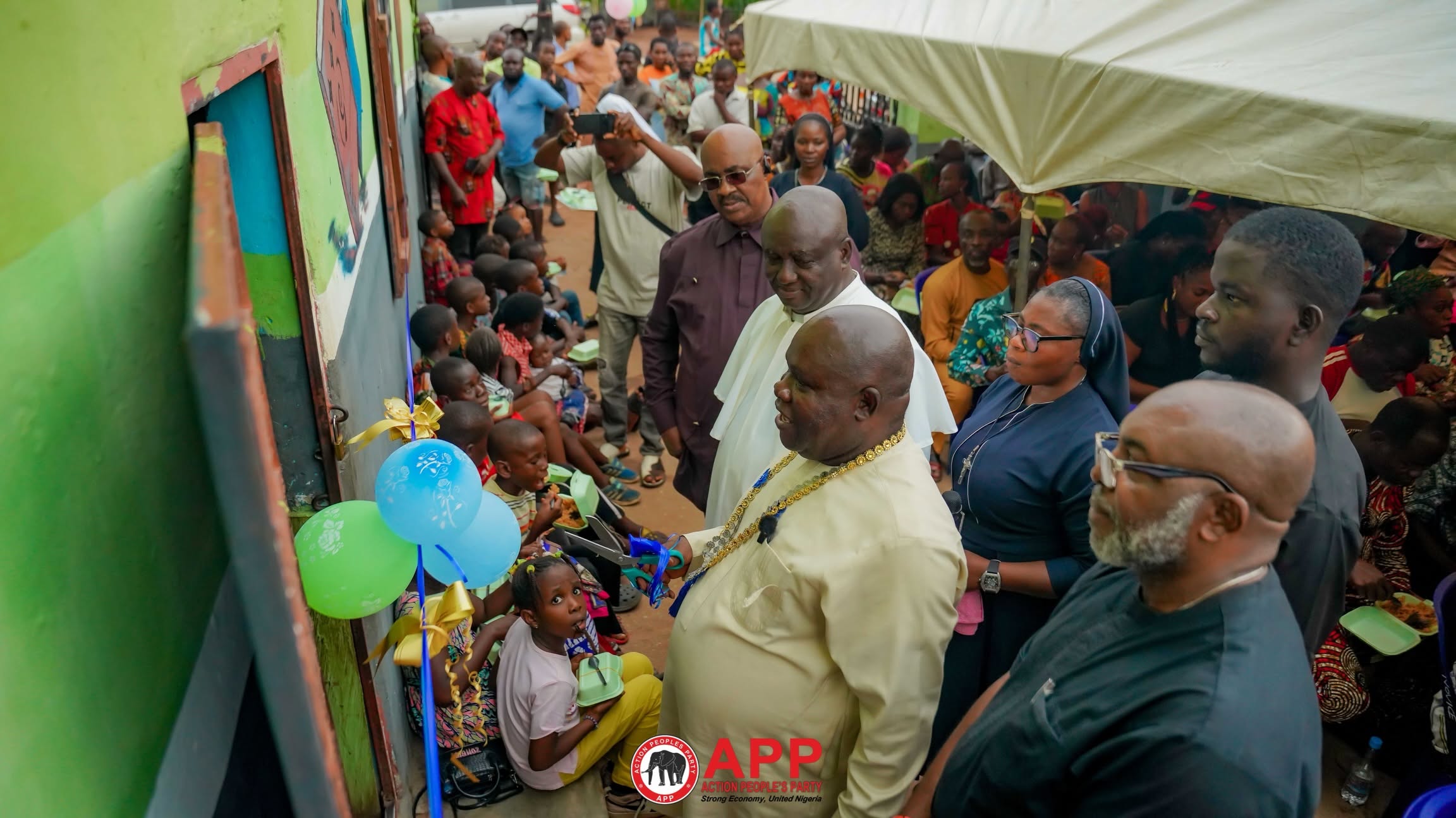 Pupils of Queen of Patriarchs Nursery and Primary School receiving Dr. Chima
